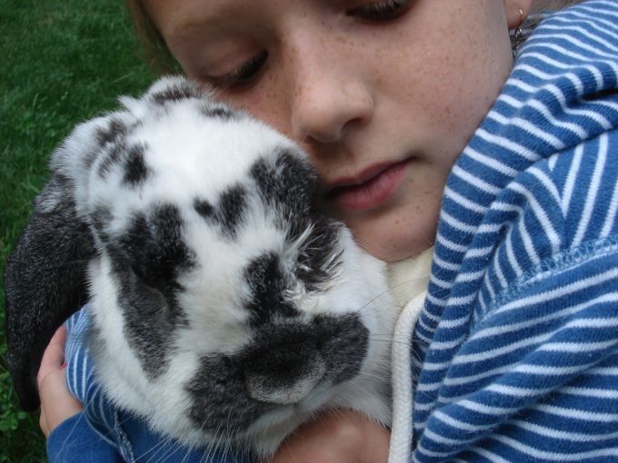 girl with pet bunny